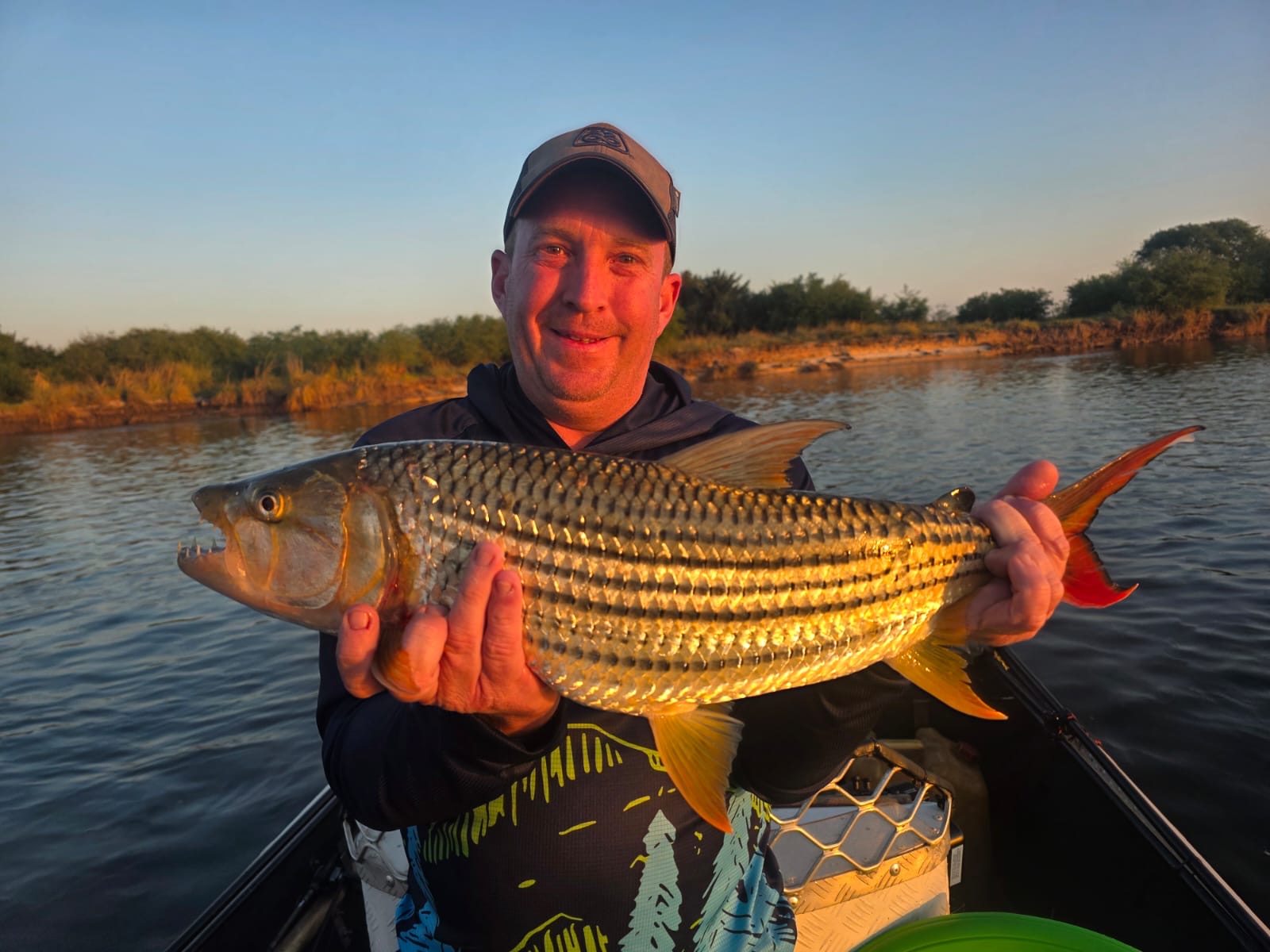 Tim with an 11.5 lb tiger in the afternoon