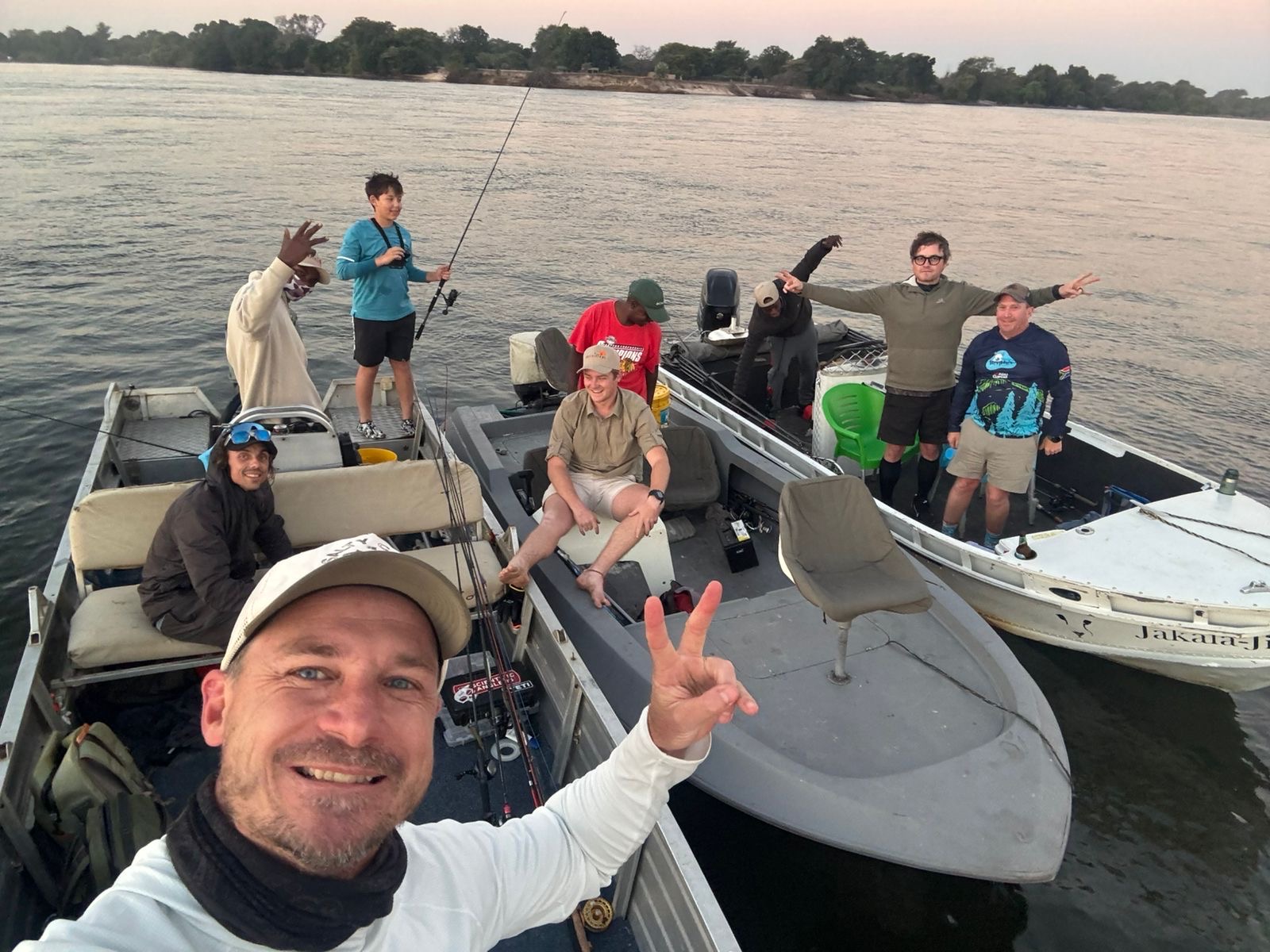 Whole crew rafted up at dusk